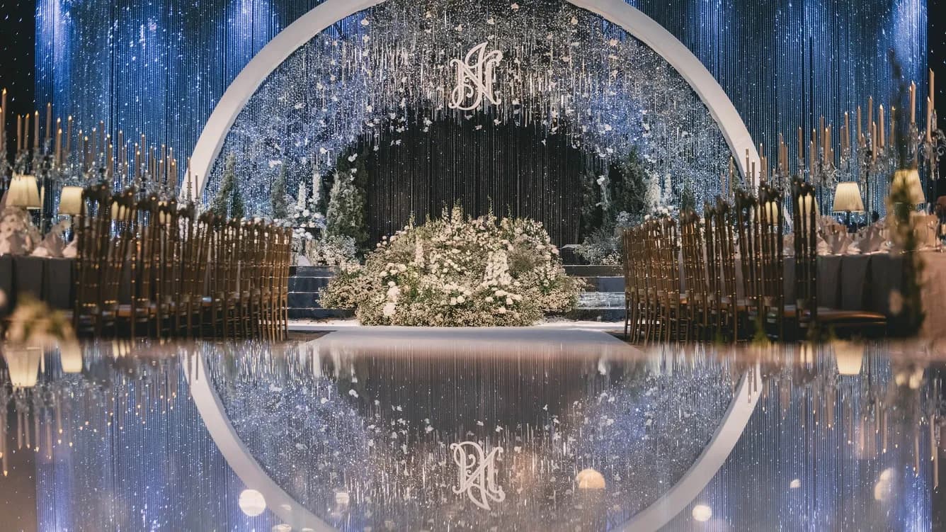 Wedding reception ballroom staged for a celebration evening at The Athenee Hotel Bangkok