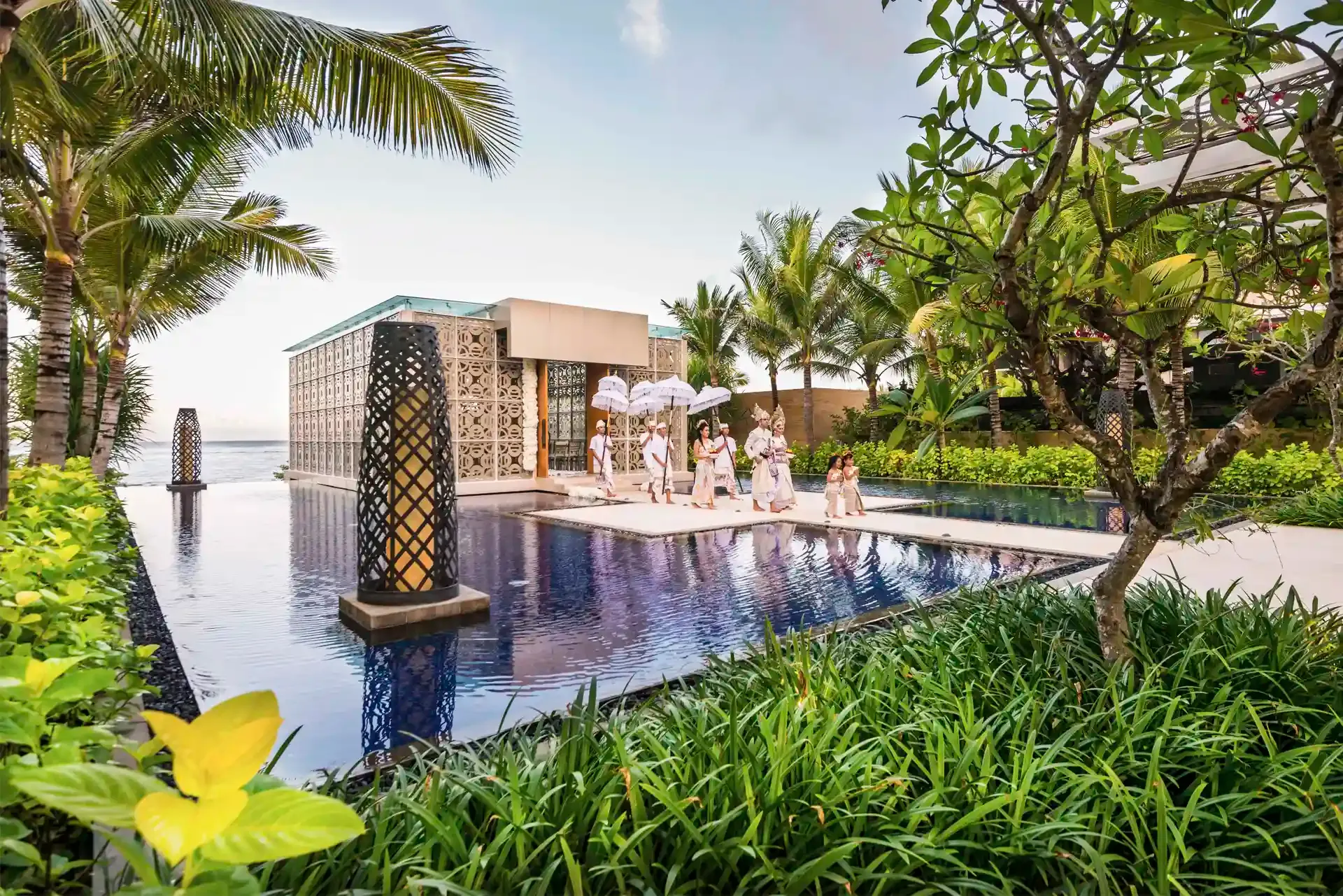 Harmony glass-framed oceanfront wedding chapel facing the Indian Ocean at The Mulia Bali
