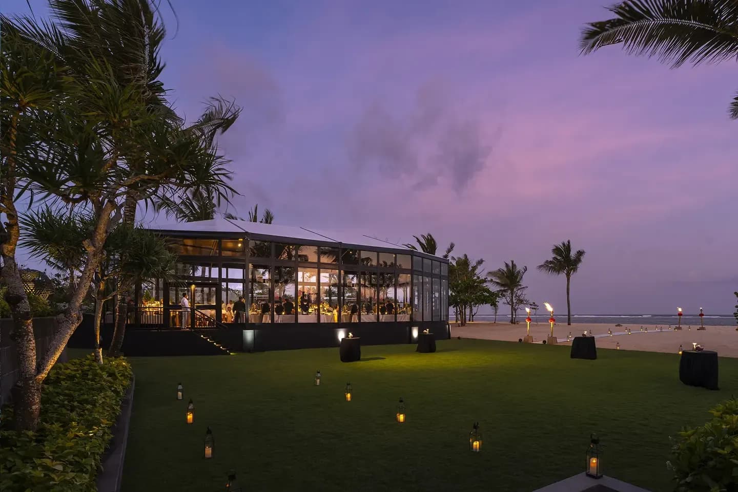 Mulia Glass House indoor-outdoor wedding pavilion with ocean views at The Mulia Bali, Nusa Dua