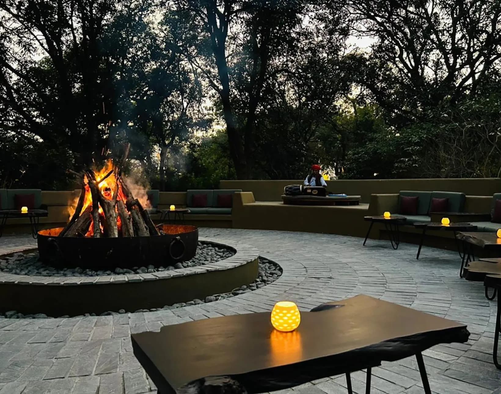 Evening amphitheatre setting for a sangeet celebration under the stars at The Oberoi Vanyavilas Ranthambore