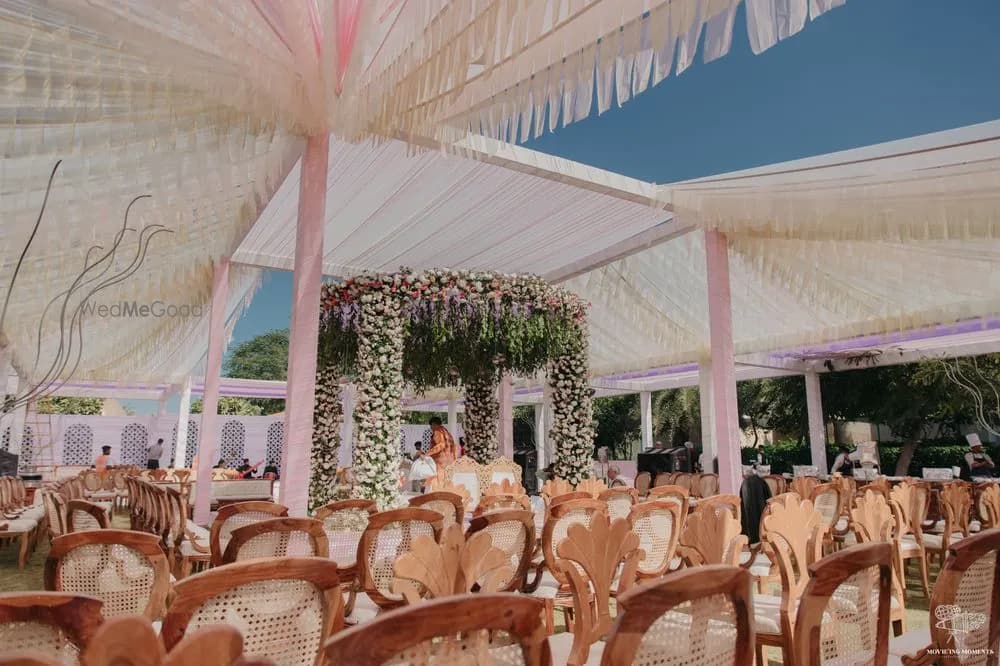 Floral mandap set under a draped white canopy on the lawn for pheras at The Westin Pushkar Resort & Spa