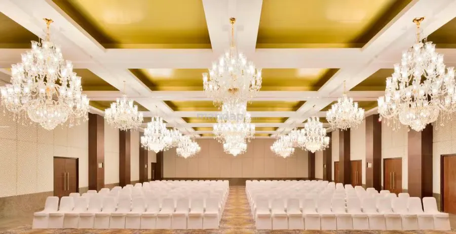 The Royal Ballroom set theatre-style for a wedding celebration under chandeliers, The Westin Pushkar Resort & Spa