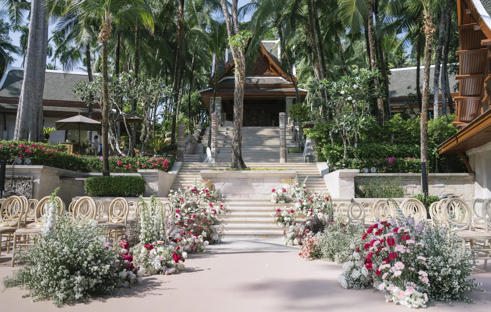 Trisara Phuket 1,000 sqm oceanfront teak deck set for a wedding reception dinner above the sea