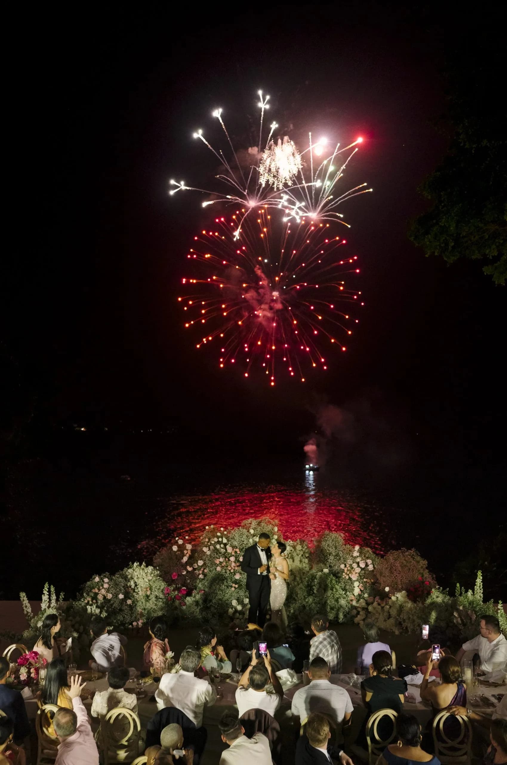 Trisara Phuket sunset wedding ceremony on the oceanfront teak deck above the Andaman Sea