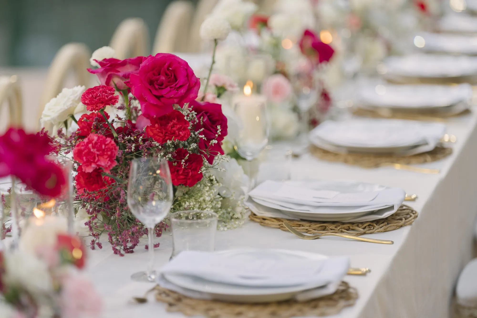 Trisara Phuket deck-side evening wedding celebration at golden hour over the Andaman Sea