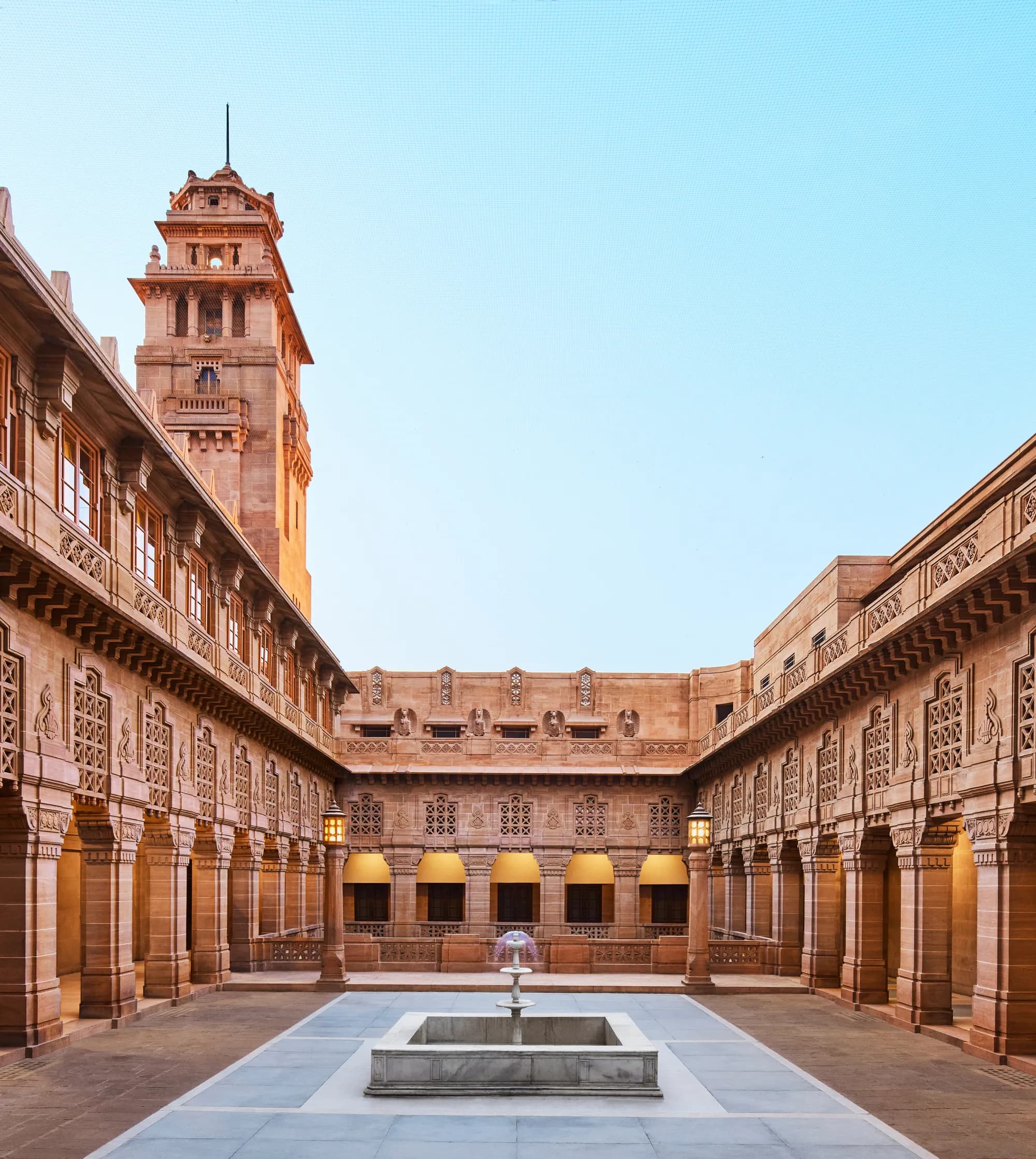 Umaid Bhawan Palace golden sandstone Art-Deco facade and central dome above the Blue City in Jodhpur