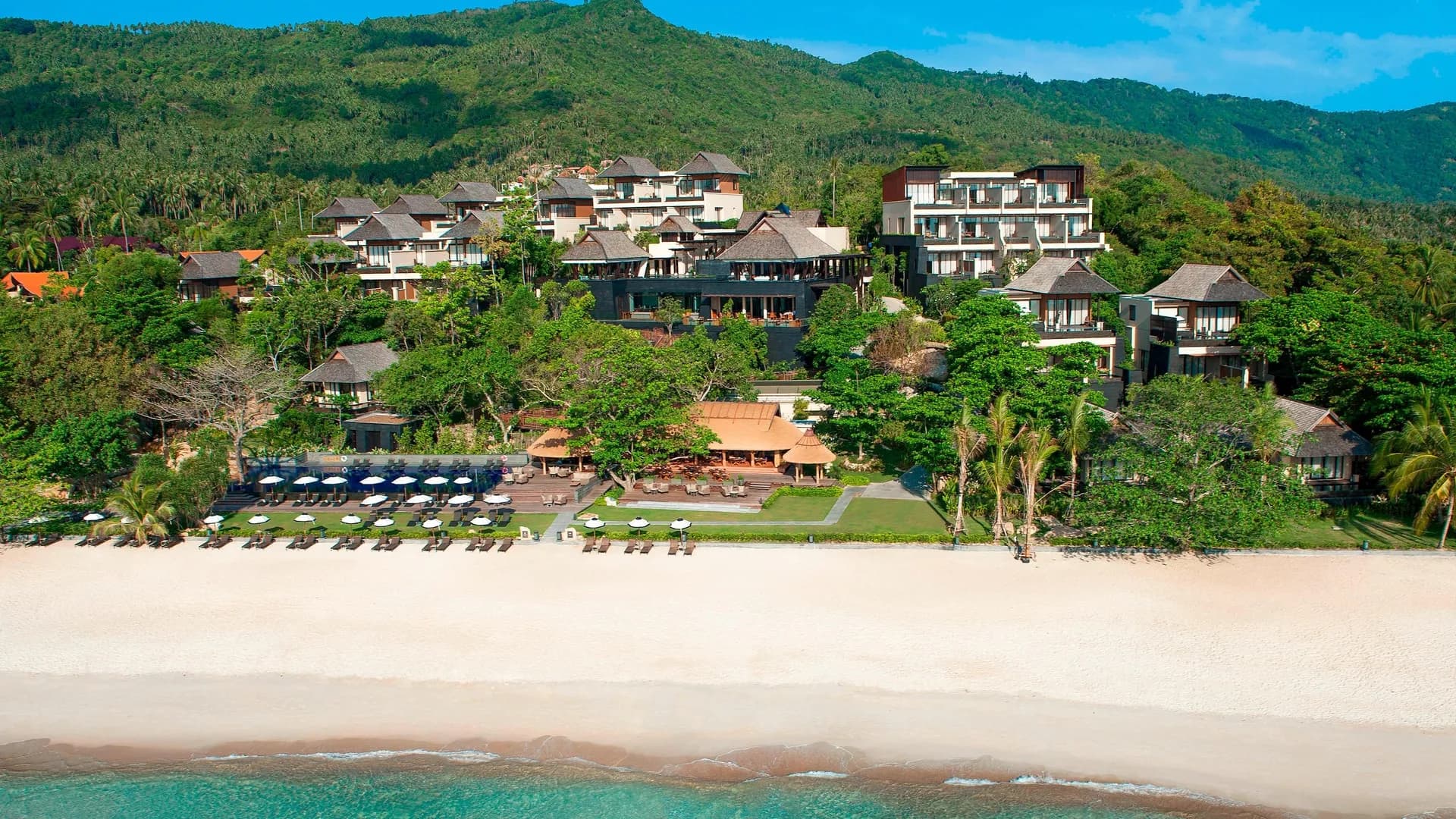 Vana Belle Luxury Collection resort hillside villas and infinity pools above Chaweng Noi Beach, Koh Samui, Gulf of Thailand
