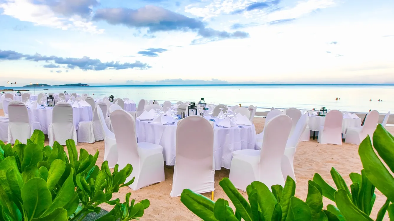 Beachfront wedding reception setup under the marquee at Vana Belle Koh Samui