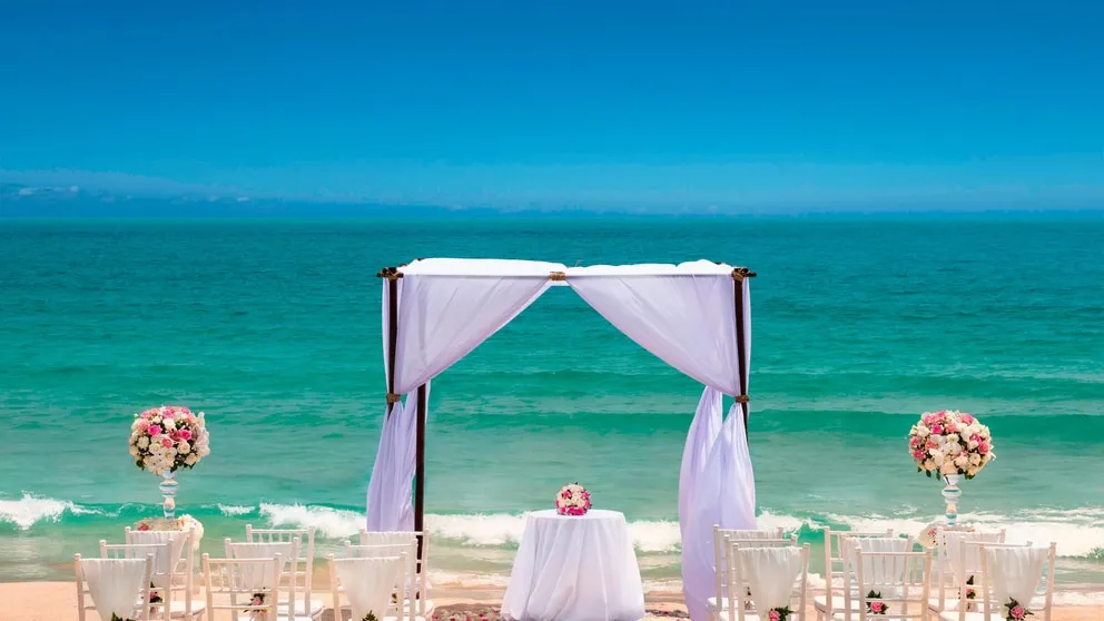 Beach wedding ceremony aisle on the white sand of Chaweng Noi Beach at Vana Belle Koh Samui