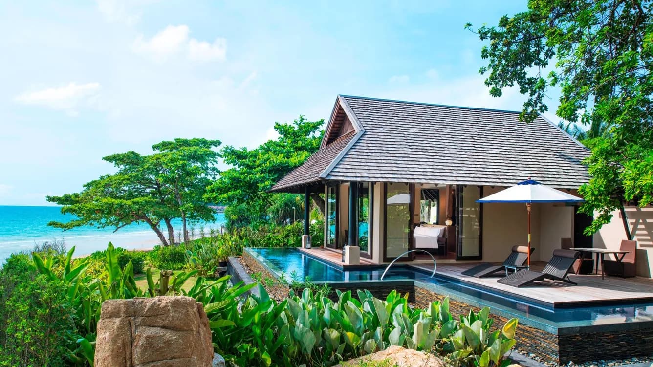 Pool villa exterior with tropical landscaping detail at Vana Belle Koh Samui