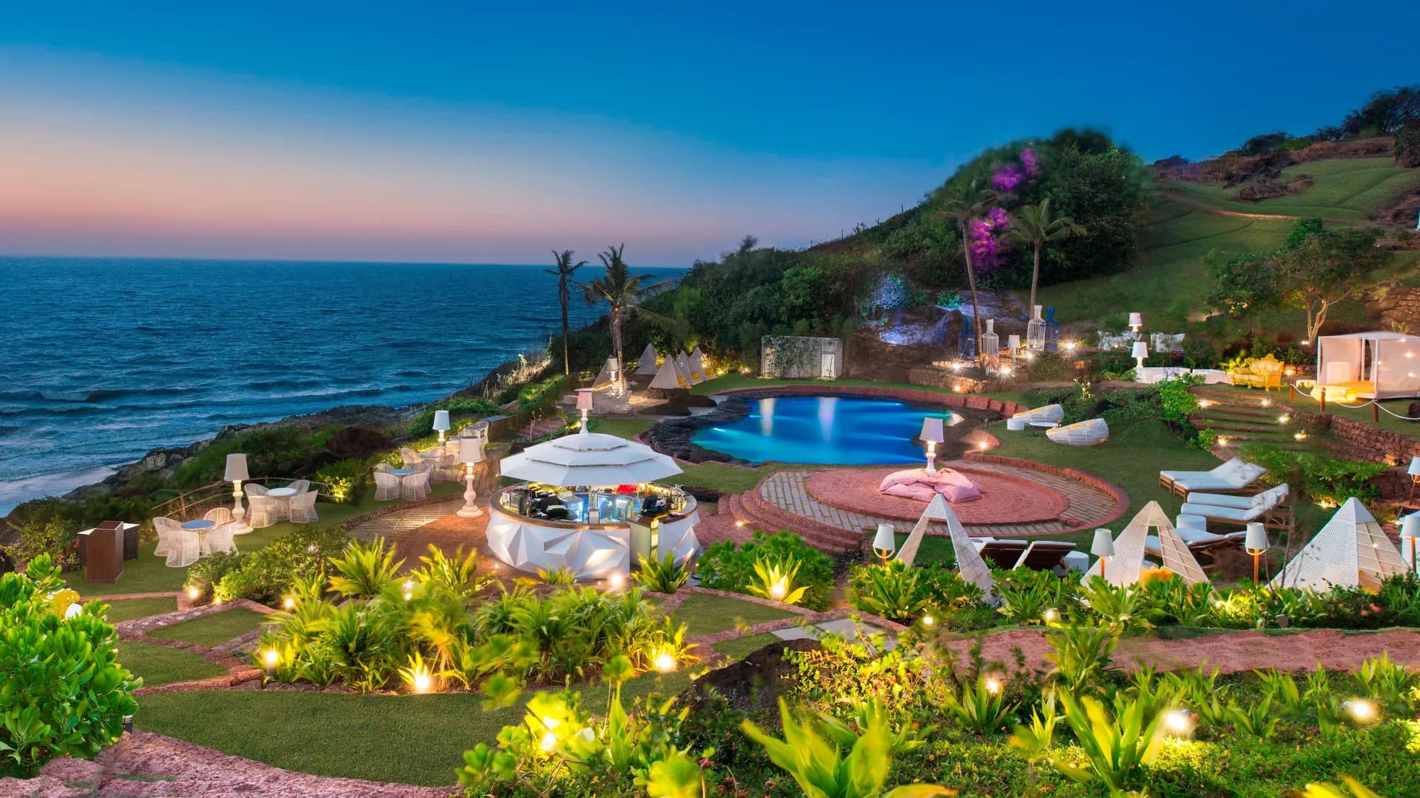 Cliffside sunset setting overlooking the Arabian Sea at W Goa, Vagator