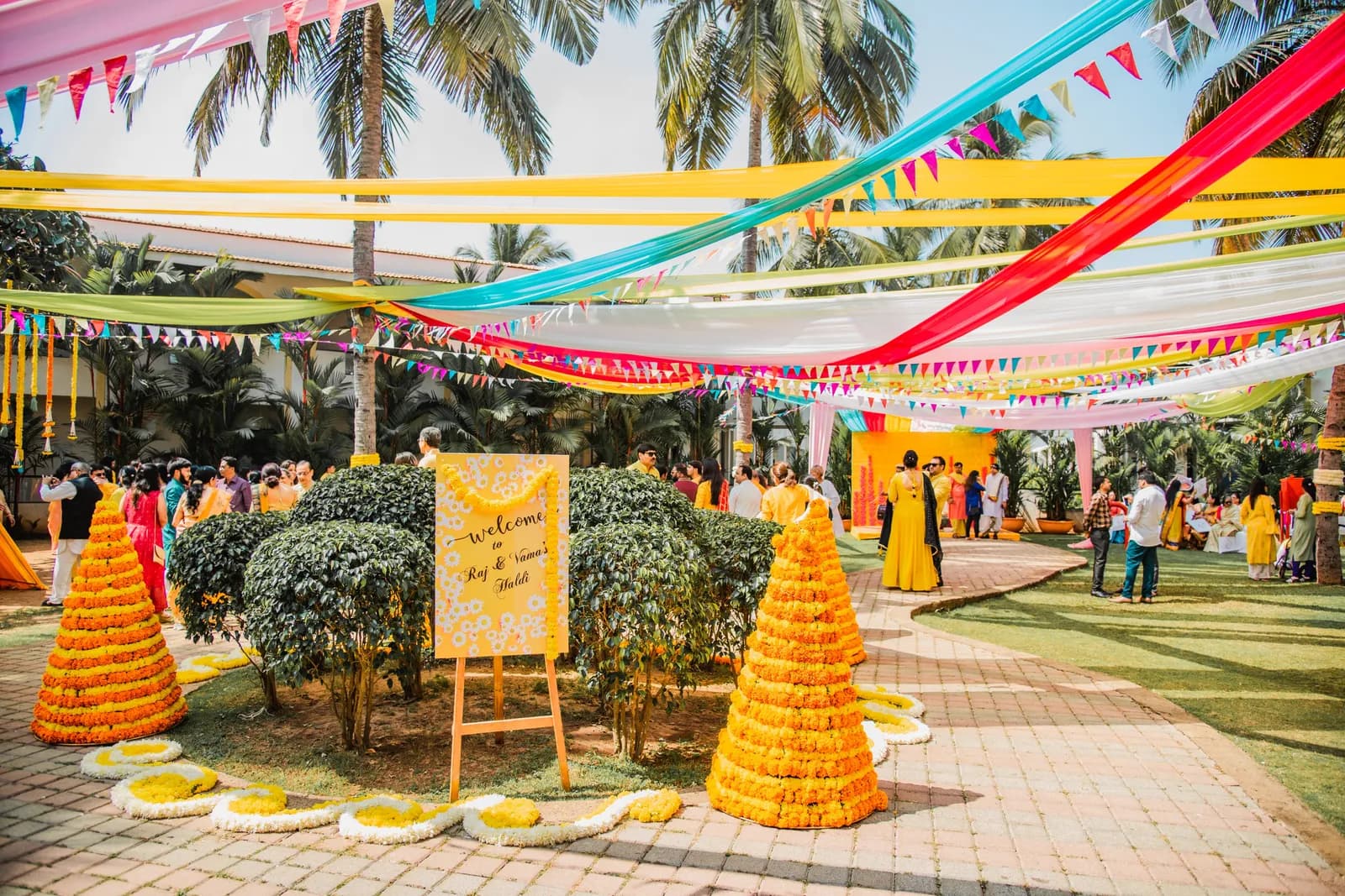 Raj & Vama — Haldi celebration with floral Holi