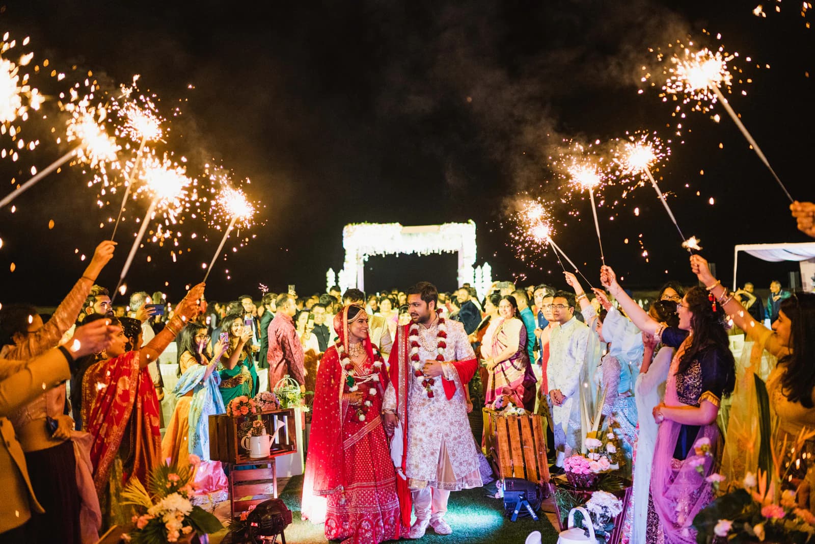 Elite Wedding Planner team behind a destination wedding sparkler send-off