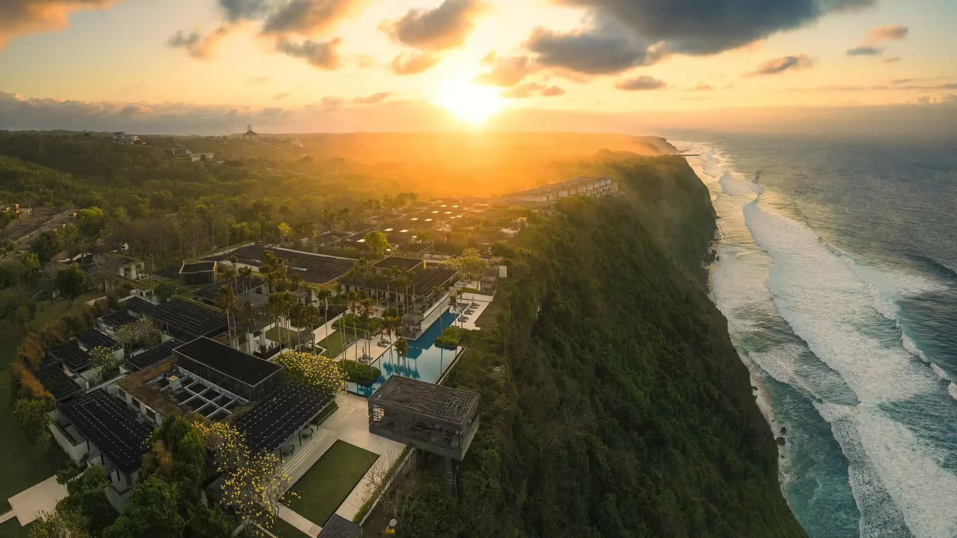 Sunrise panorama across the clifftop estate and Indian Ocean at Alila Villas Uluwatu, Bali