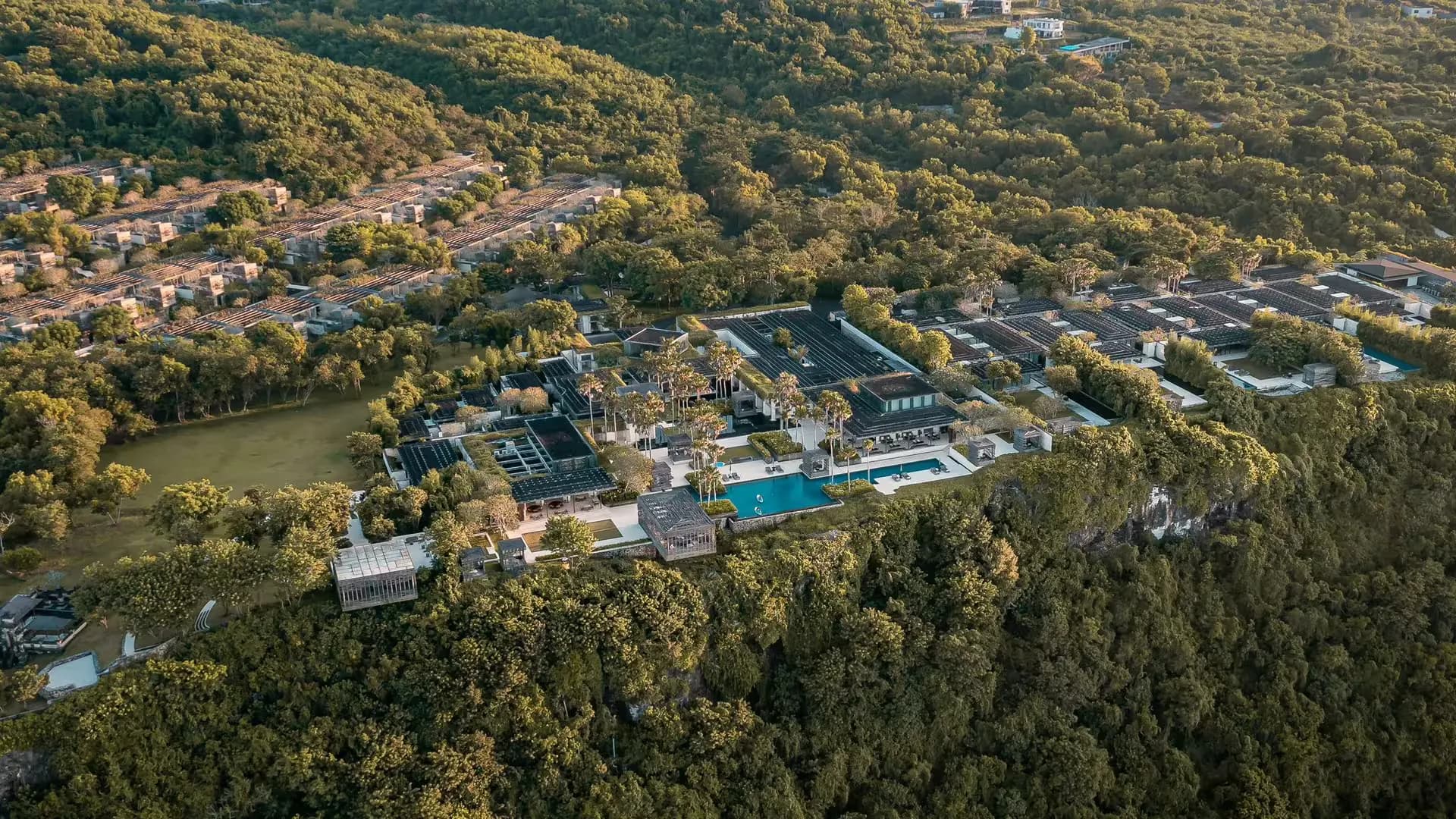 Aerial of Alila Villas Uluwatu WOHA-designed clifftop villa estate above the Indian Ocean, Bukit Peninsula Bali