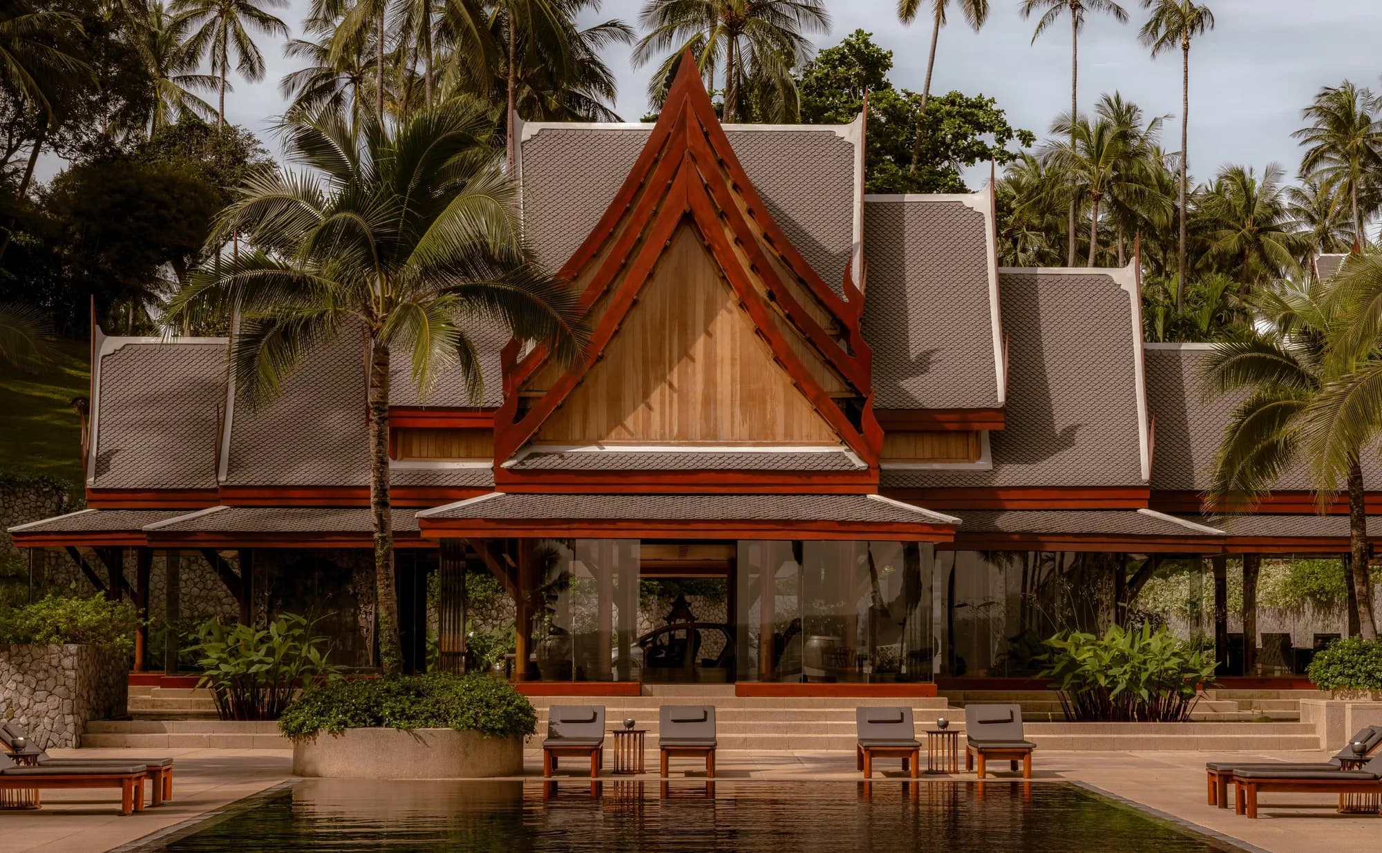 Main reflecting pool and pavilion lobby arrival area at Amanpuri, Phuket