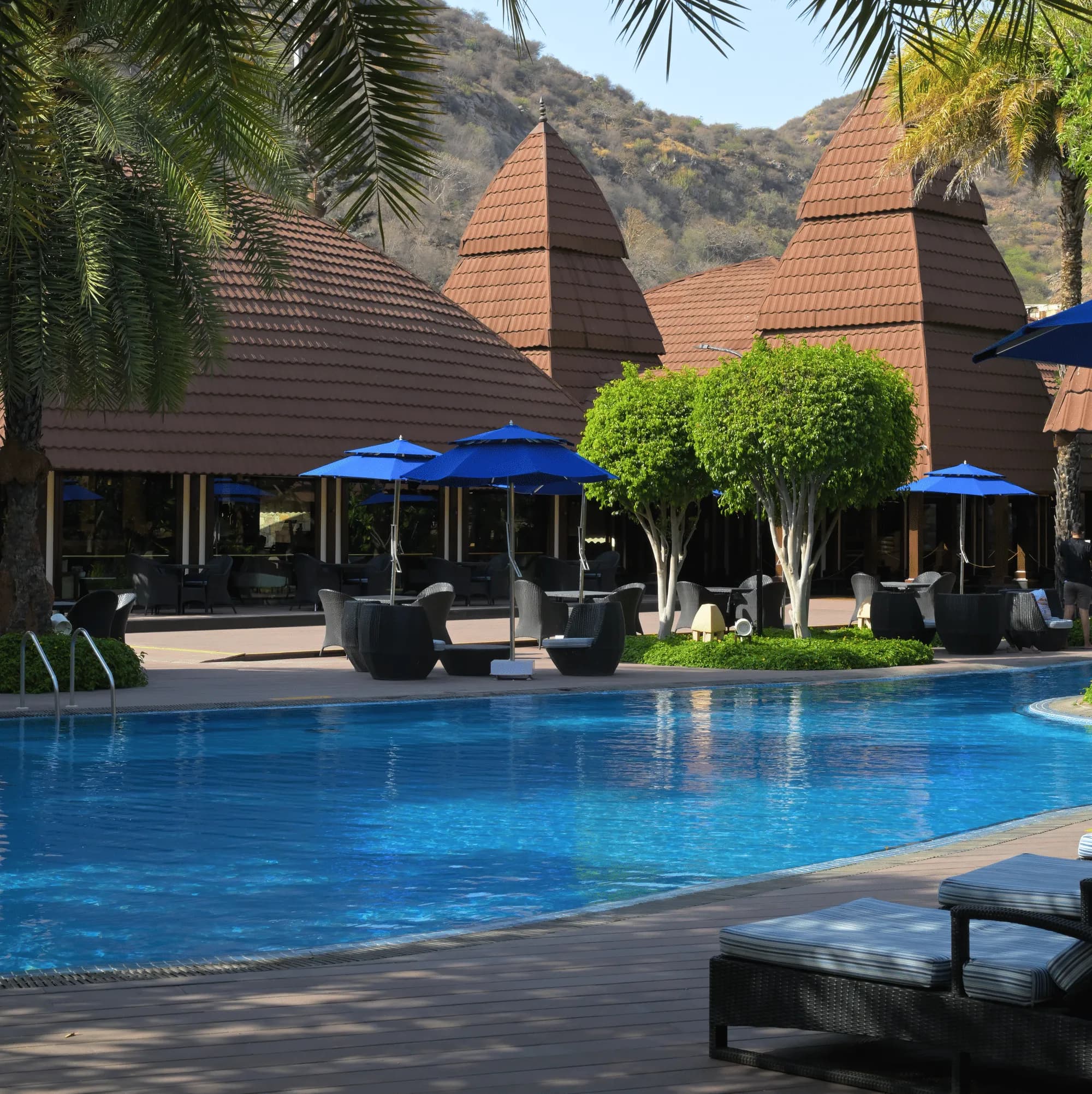 Swimming pool and landscaped grounds at Ananta Spa & Resort Pushkar