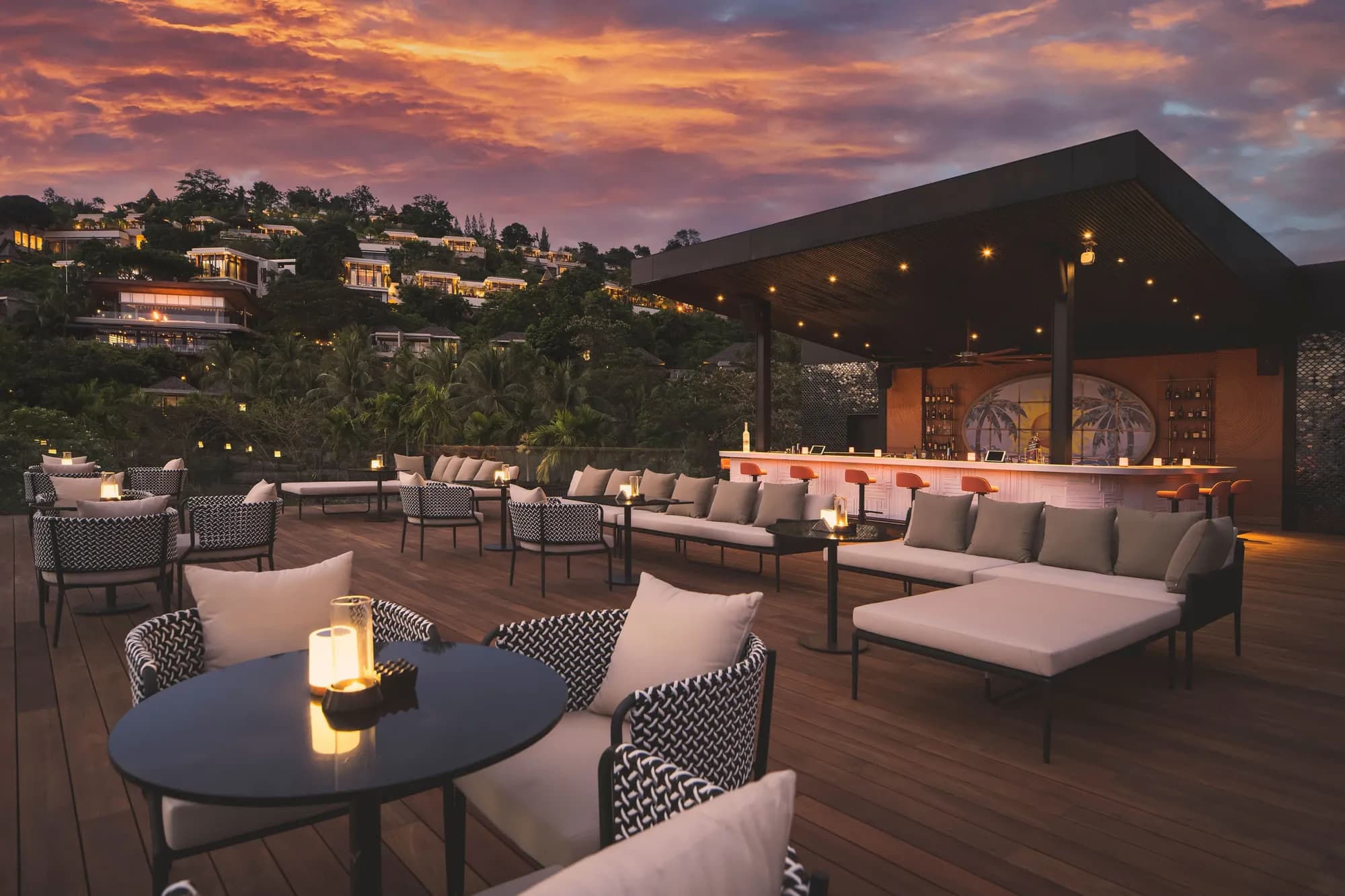 Anantara Layan Phuket Resort rooftop bar with panoramic Andaman Sea views set for evening