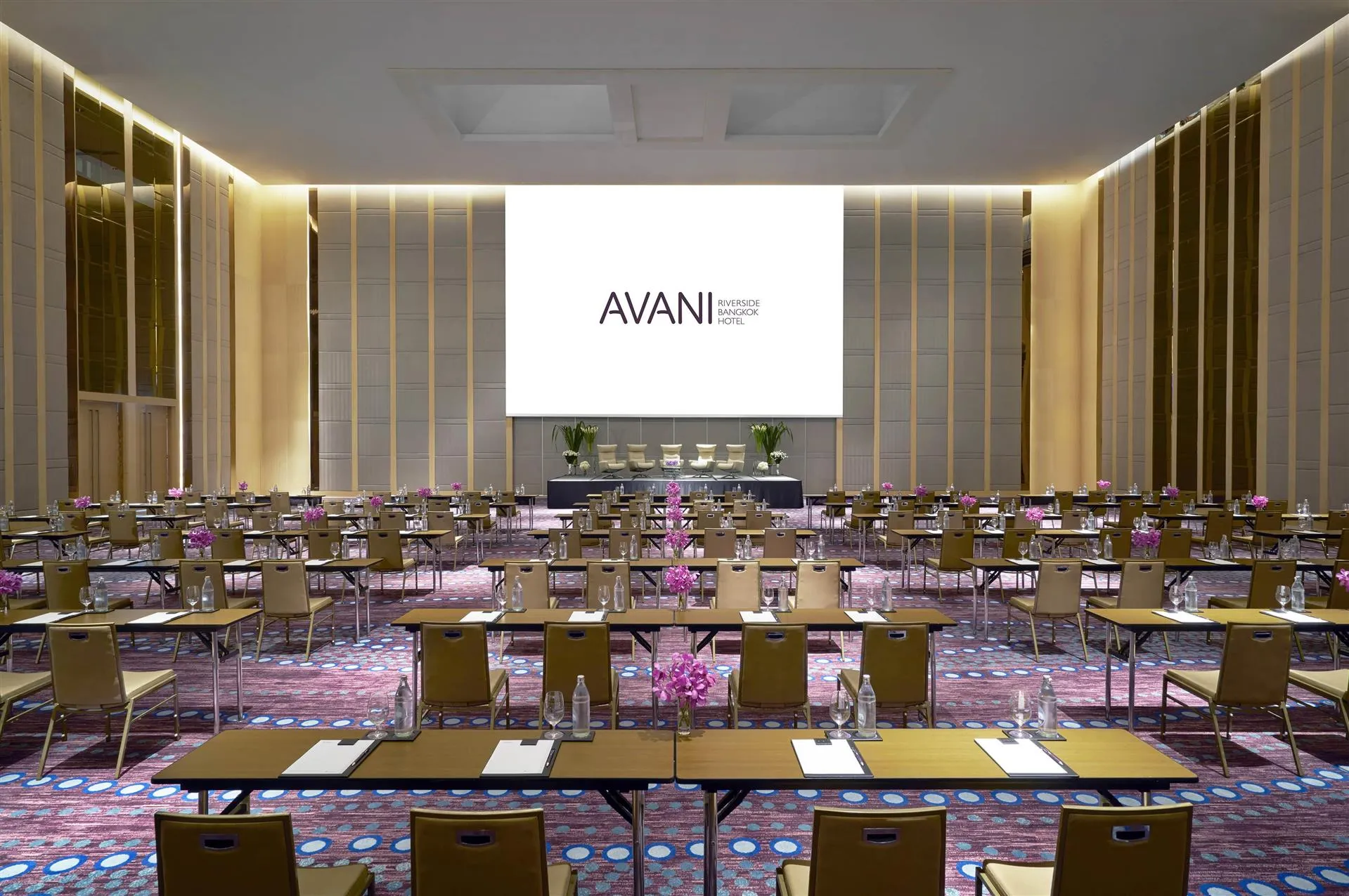 Grand Riverside Ballroom at AVANI+ Riverside Bangkok set for a banquet under a soaring 11-metre ceiling