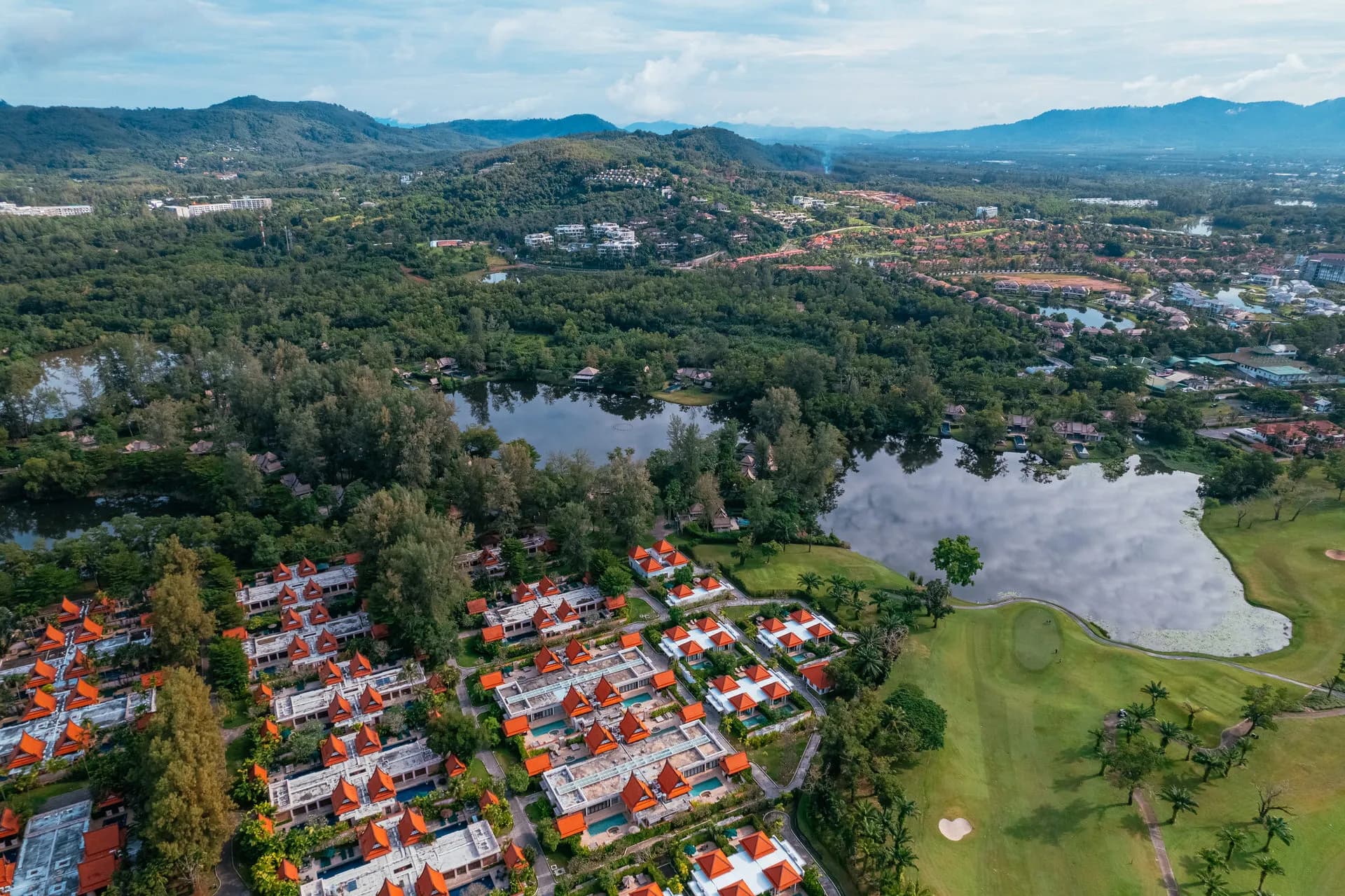 Aerial view of Banyan Tree Phuket all-pool-villa lagoon resort and gardens on Bang Tao Bay, Thailand
