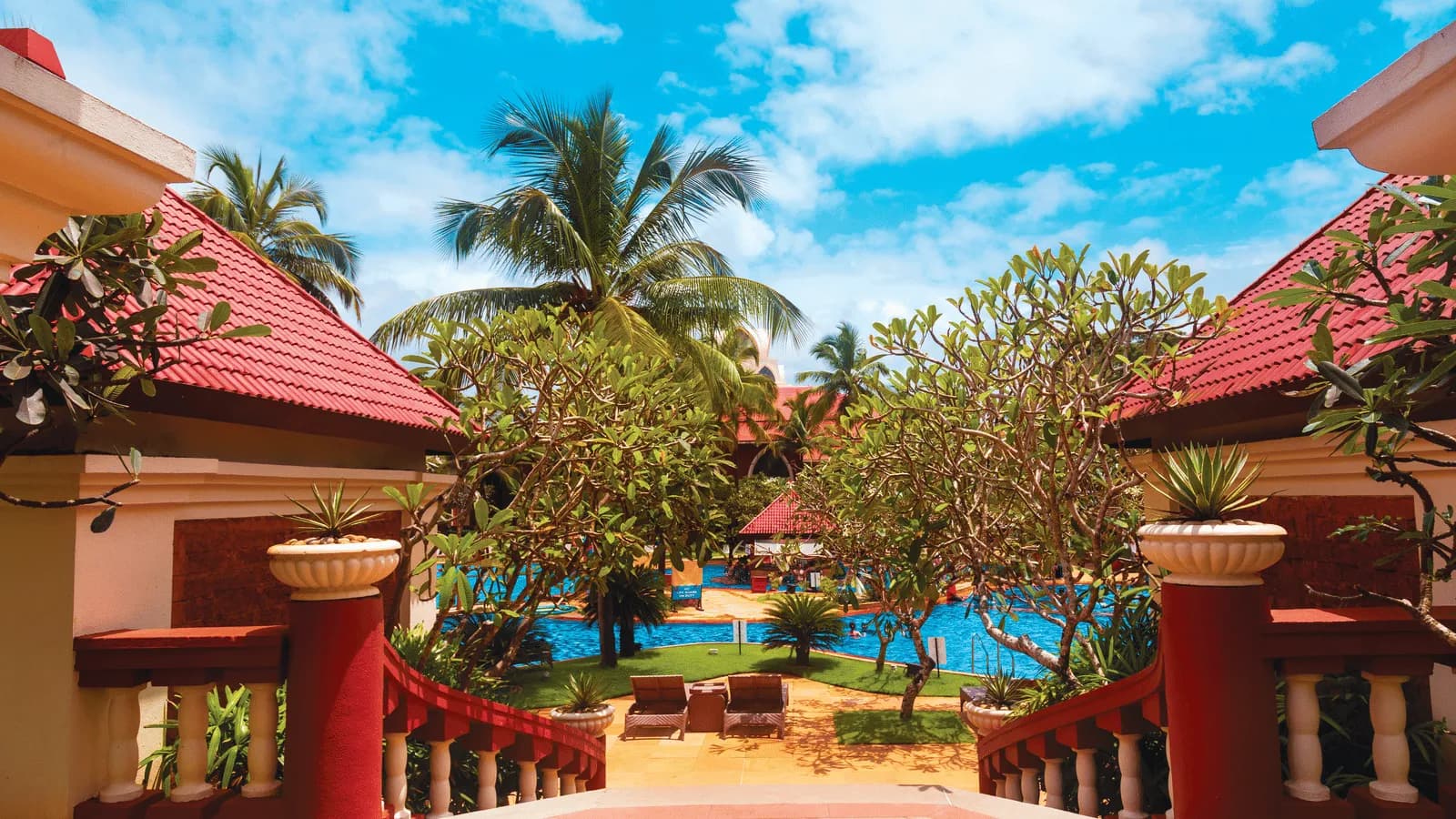 Aerial view of Caravela Beach Resort Goa golf course and beachfront in Varca