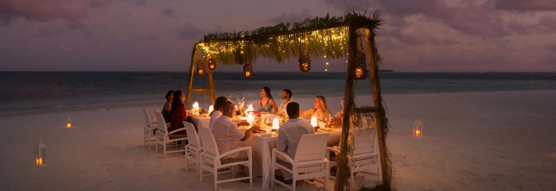 White-sand beach and clear turquoise lagoon wedding ceremony setting at Conrad Maldives Rangali Island