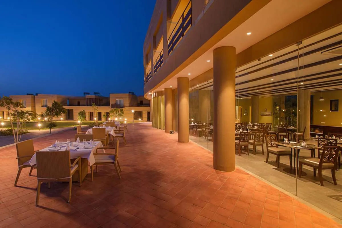 Dera Masuda luxury design resort in Pushkar with Indo-Saracenic architecture below the Savitri Temple hill and Aravalli ranges