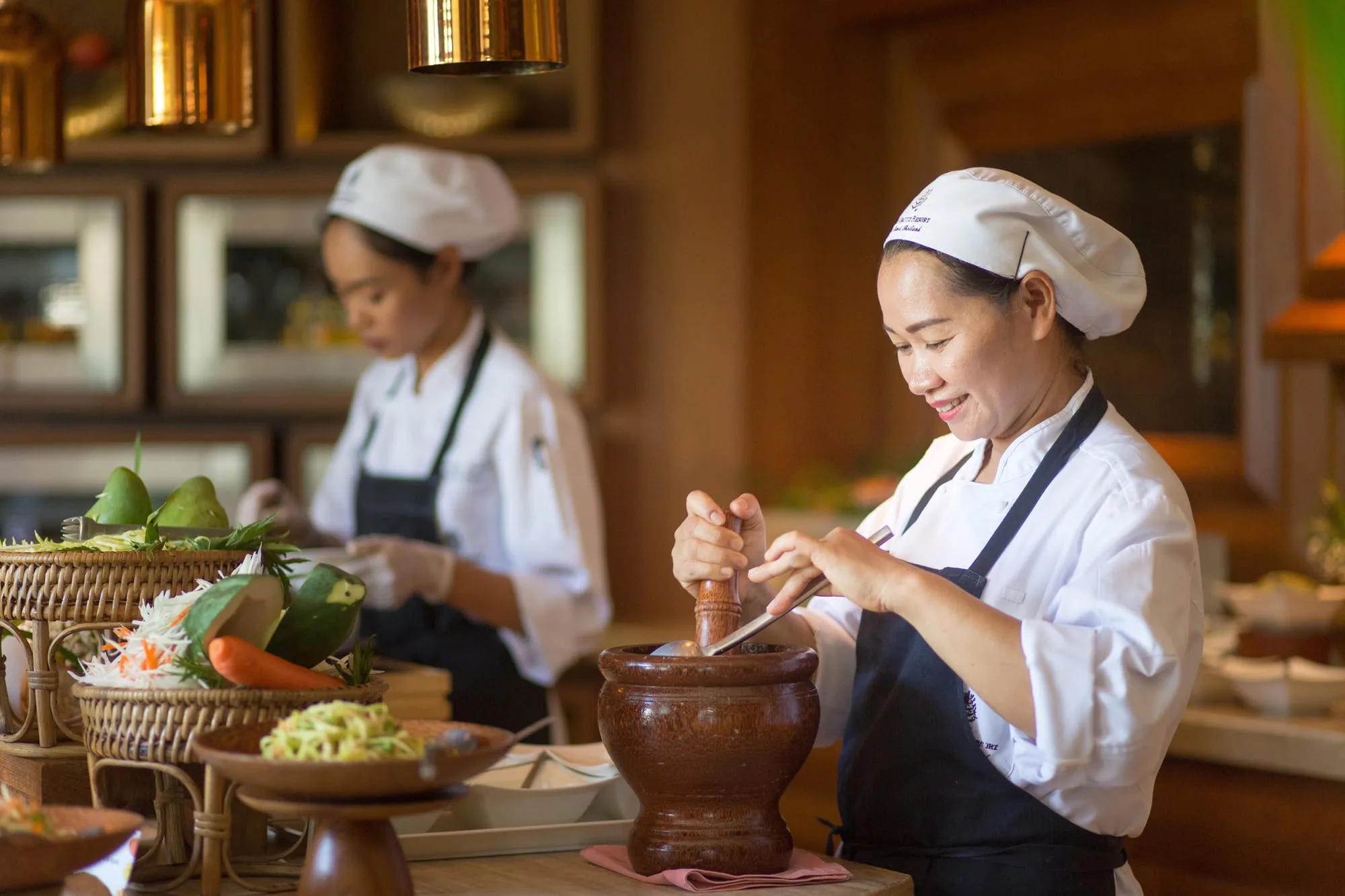 Four Seasons Resort Koh Samui terraced coconut-grove hillside estate dropping to the private cove beach on Laem Yai Bay