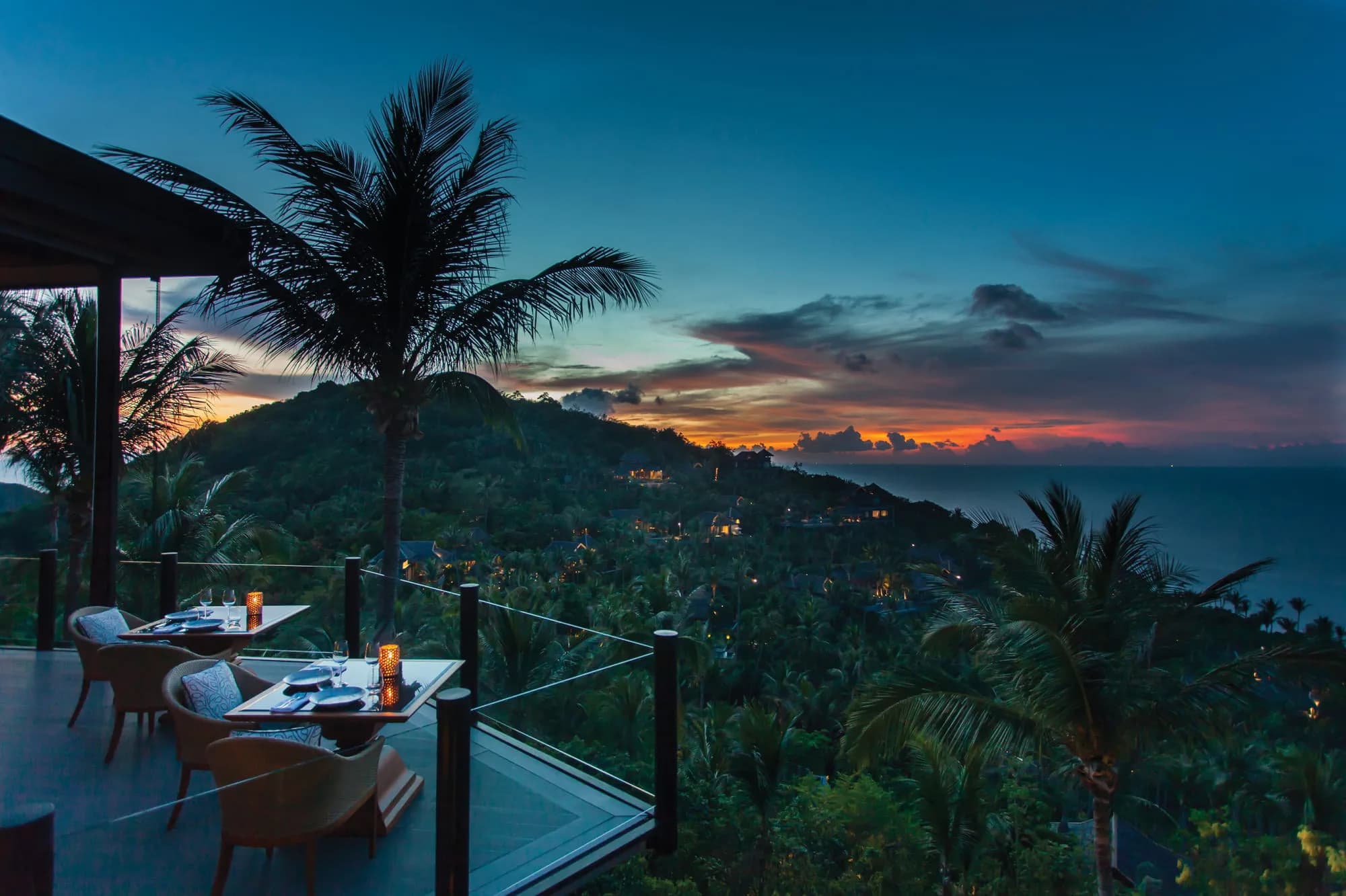 Four Seasons Resort Koh Samui ocean-view lawn set for a wedding reception dinner above Laem Yai Bay
