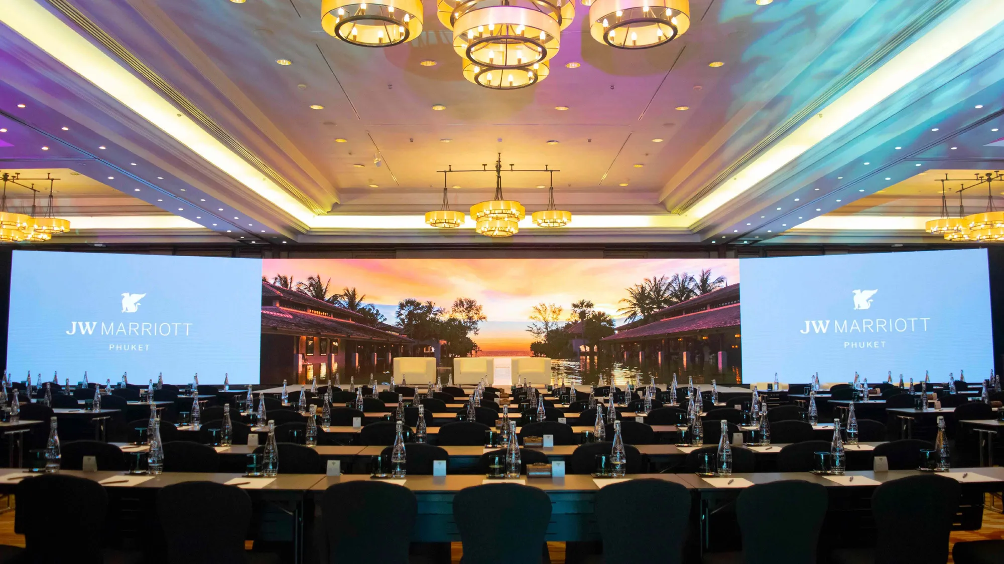 Mai Khao Ballroom set with round tables for a banquet at JW Marriott Phuket Resort & Spa