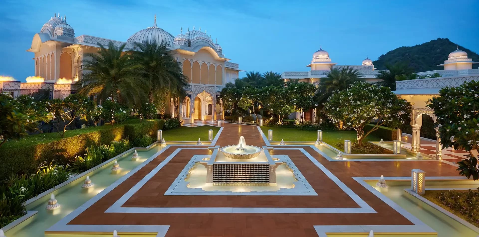 The Leela Palace Jaipur palace-resort facade with Rajput-Mughal architecture near Amer Fort, Jaipur