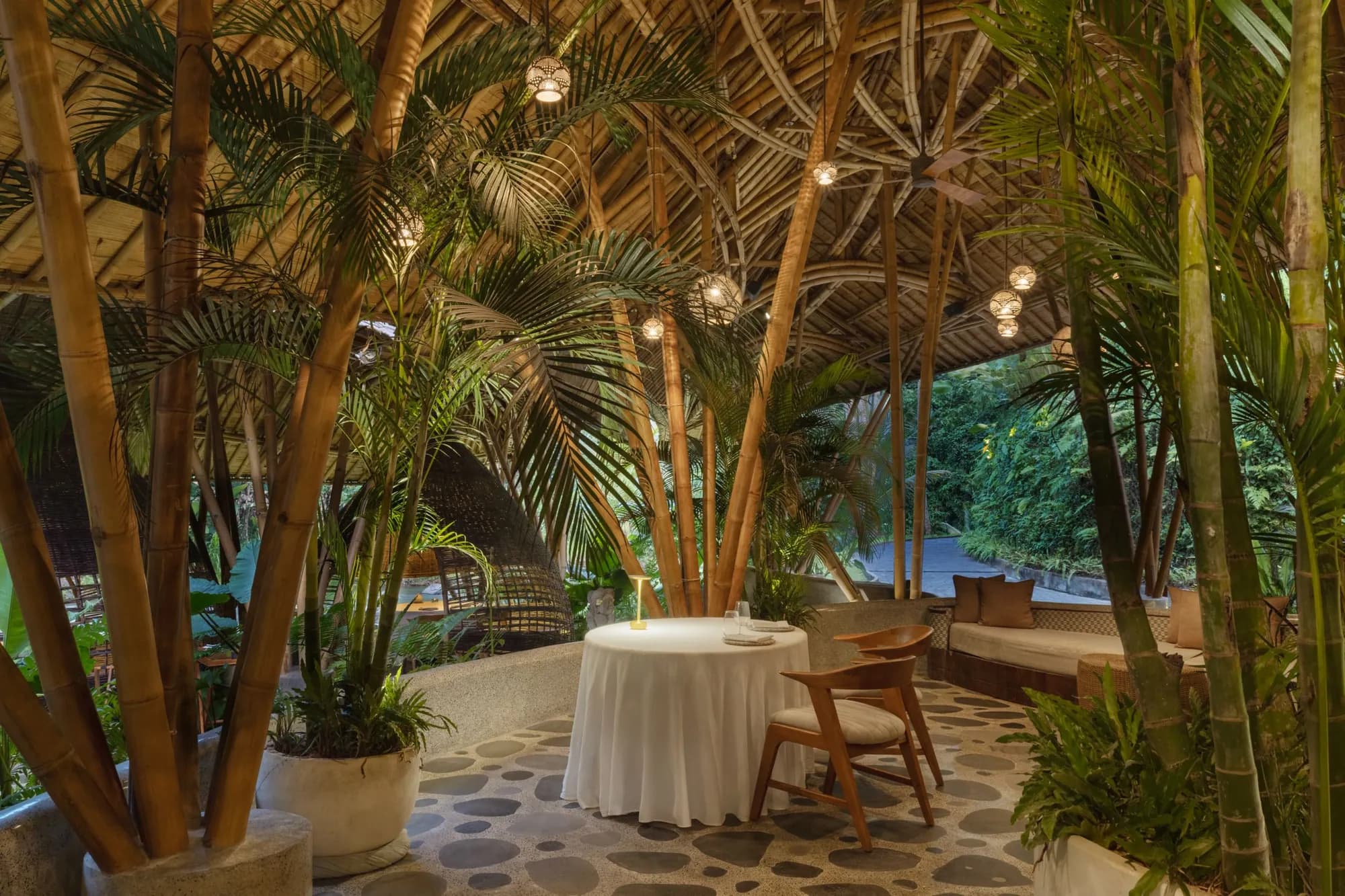 Kubu restaurant bamboo dome pavilion beside the Ayung River at Mandapa Ubud Bali