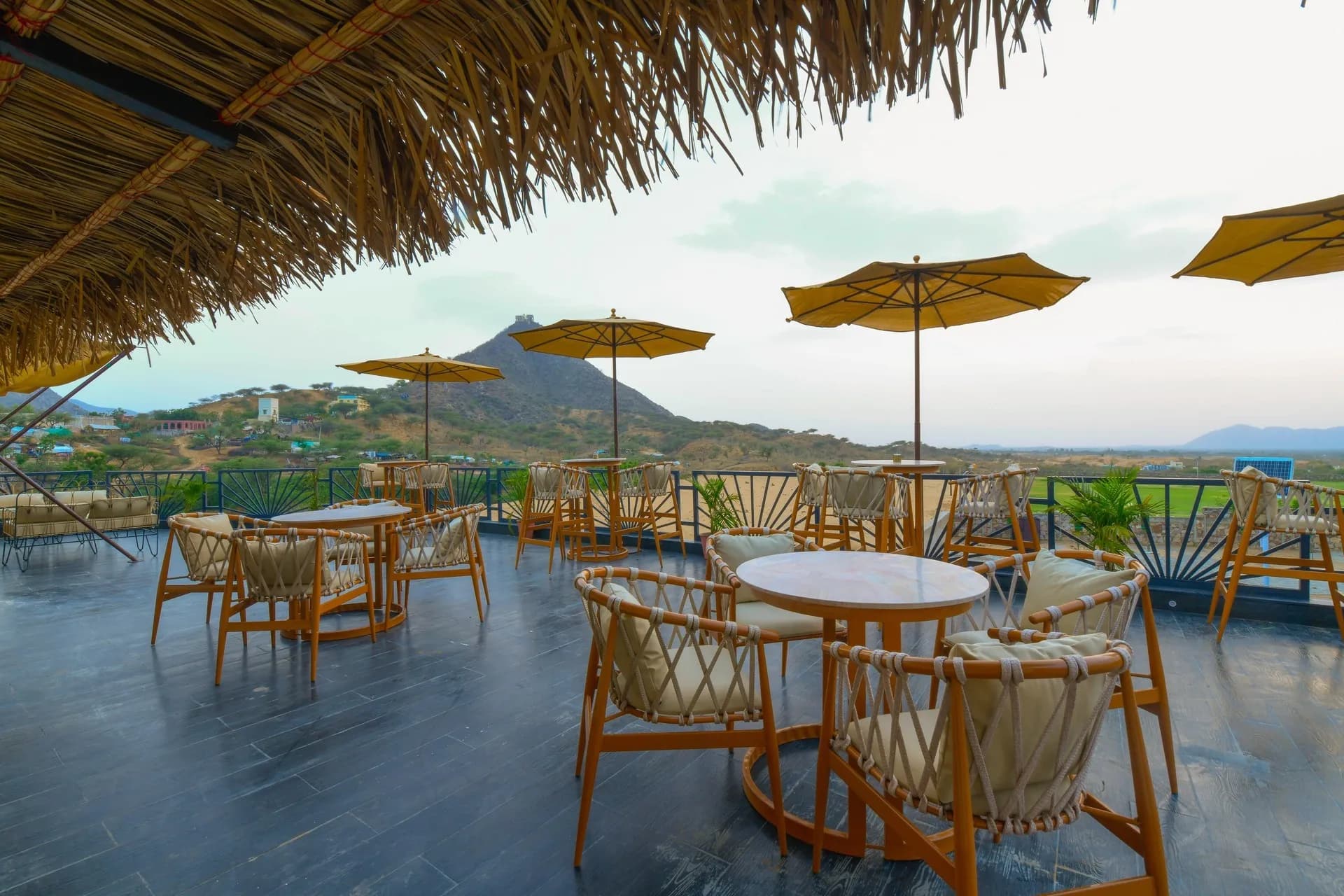 Rawai Luxury Tents Pushkar canvas camp glowing under the Aravalli sky at dusk