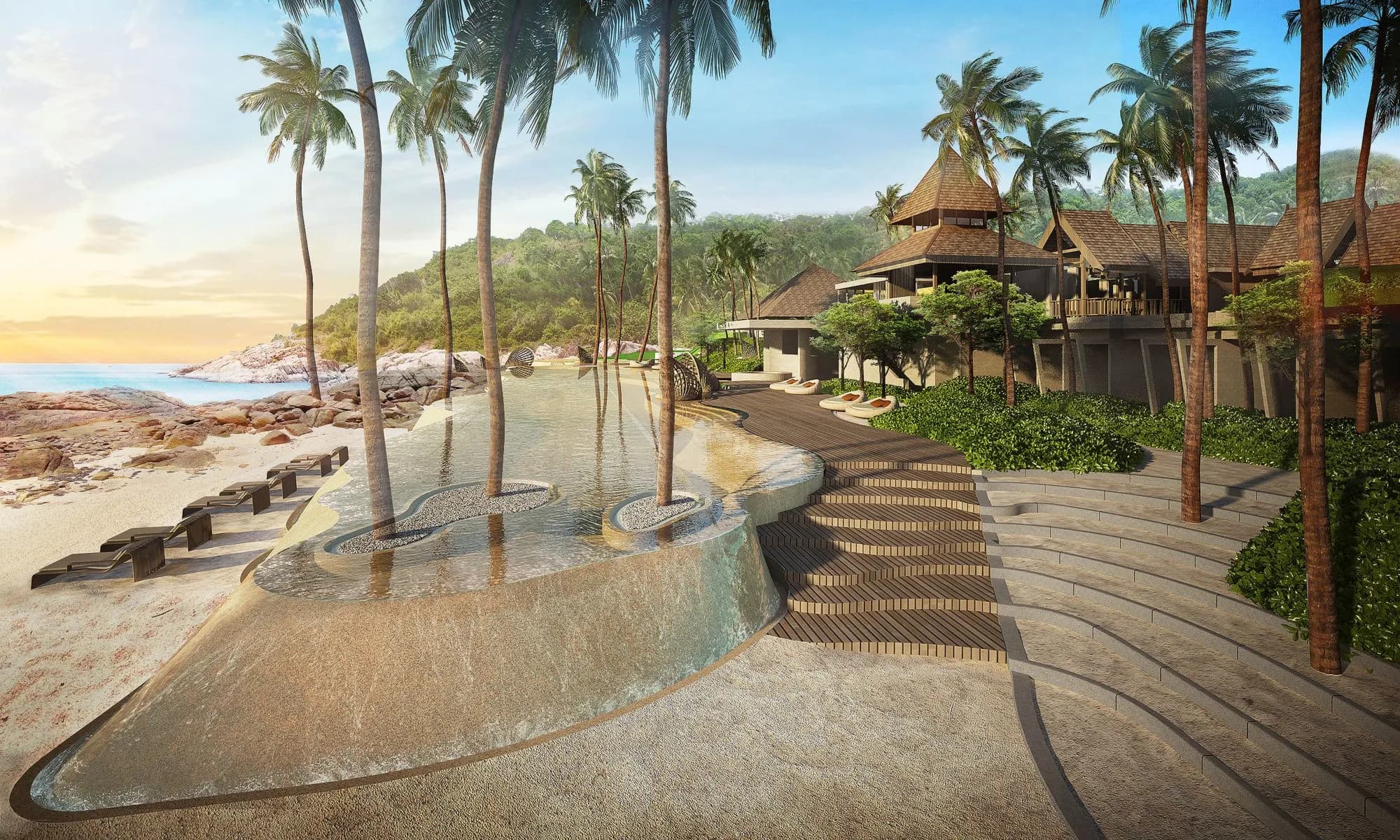 Beachfront pool, palms and steps to the private beach at The Ritz-Carlton Koh Samui at sunrise
