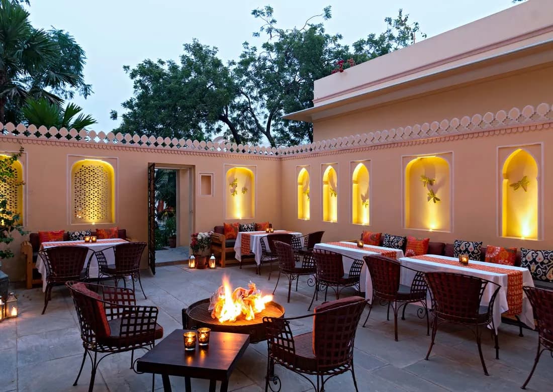 Garden and fountain court with bougainvillea inside Samode Haveli Jaipur