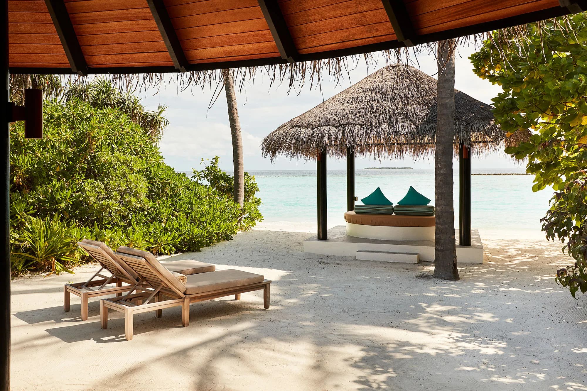 Deluxe beach villa with direct sand access at Sun Siyam Iru Fushi, Maldives
