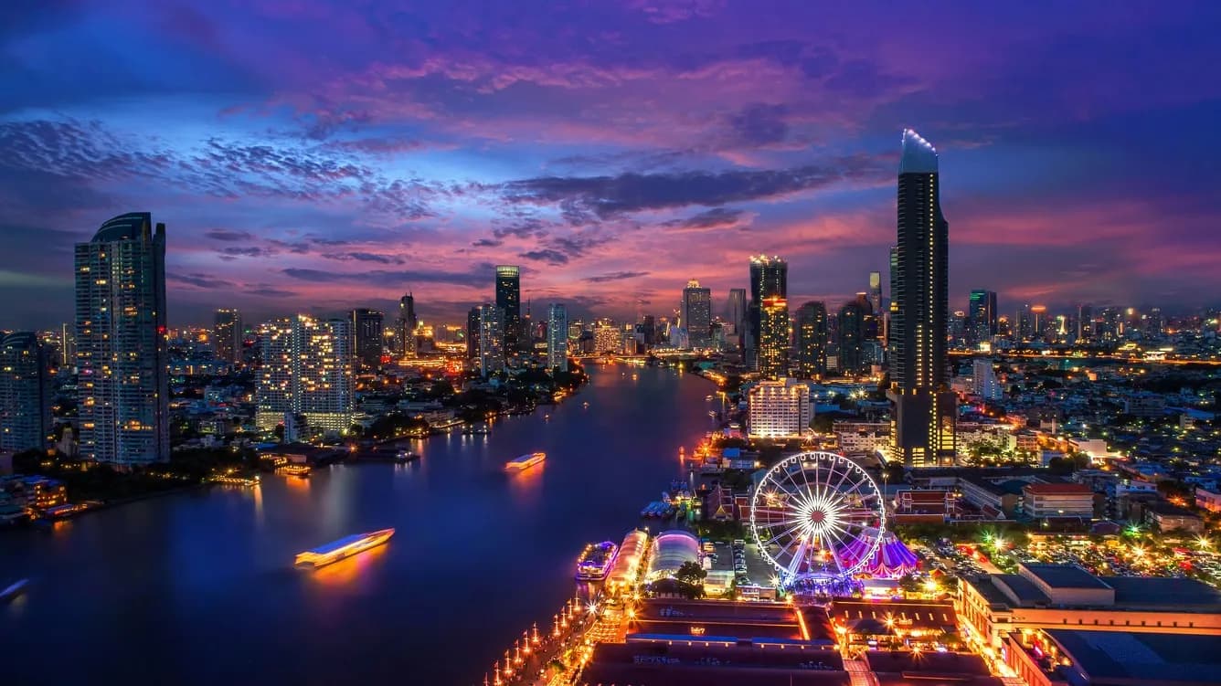 The Athenee Hotel a Luxury Collection Hotel Bangkok illuminated exterior tower on Wireless Road in the embassy district at dusk