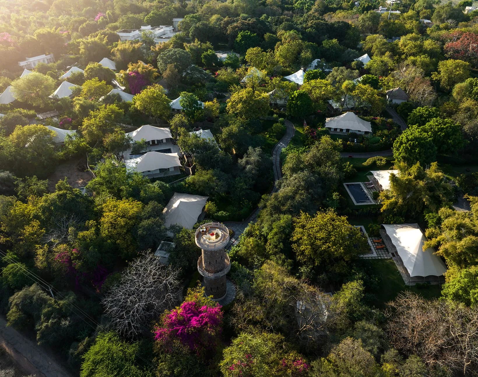 Aerial view of The Oberoi Vanyavilas Wildlife Resort with luxury tents set among mango orchards and forest on the edge of Ranthambore National Park