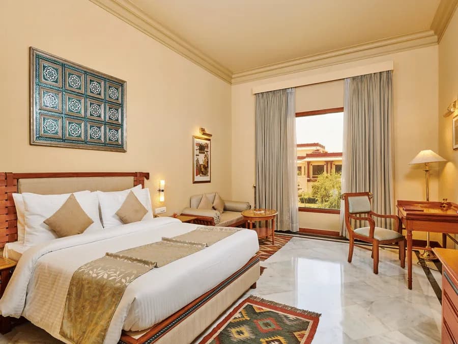 Royal courtyard king-bed guest room at The Ummed Jodhpur palace resort