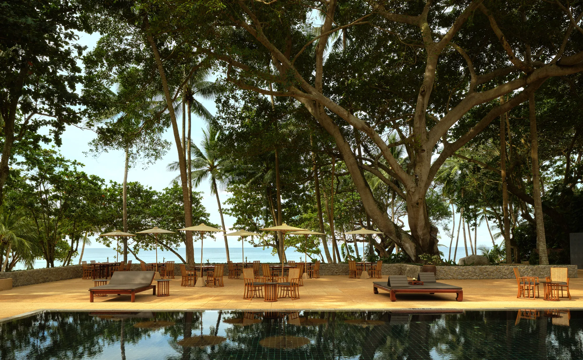 Pool Terrace table set up with Andaman Sea view at Amanpuri, Phuket