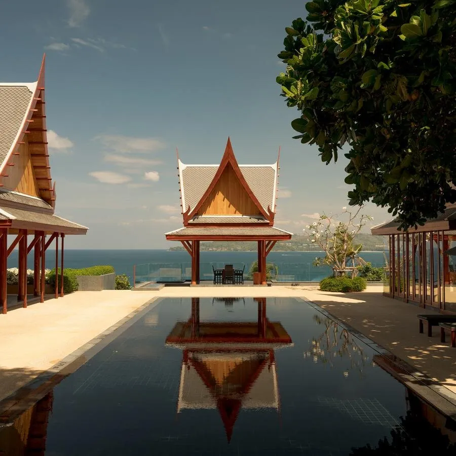 Amanpuri ocean villa terrace at sunset over the Andaman Sea, Phuket