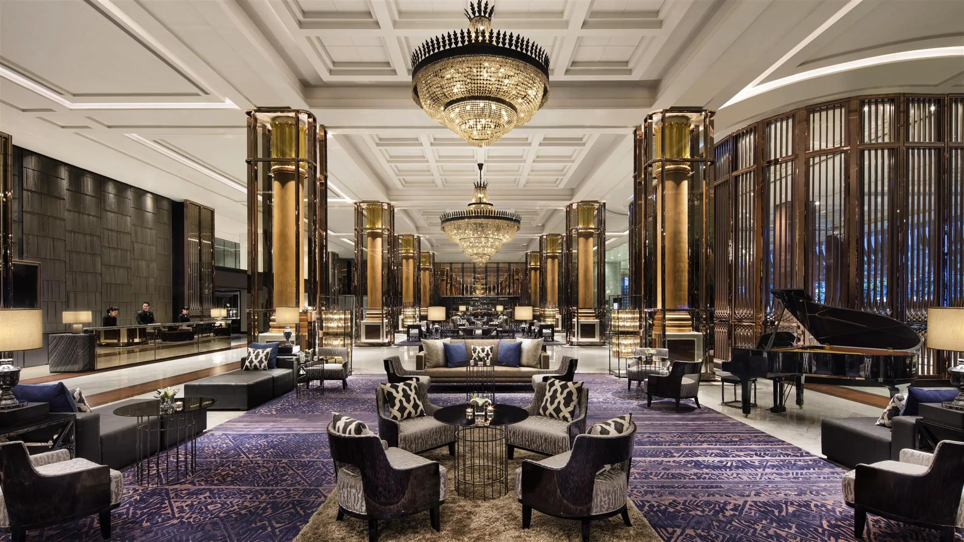 Grand arrival lobby and lounge with crystal chandeliers and gold columns at Bangkok Marriott Marquis Queen's Park