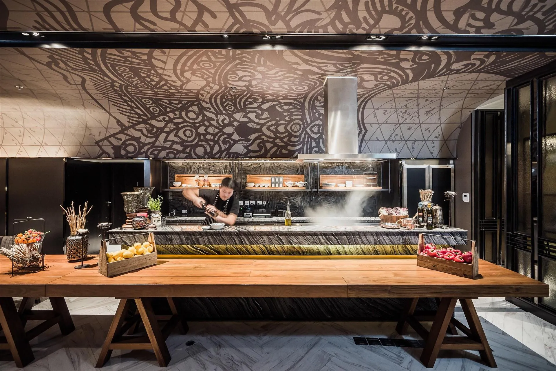 Live cooking and grilling counter beneath a hand-drawn Thai mural at Bangkok Marriott Marquis Queen's Park