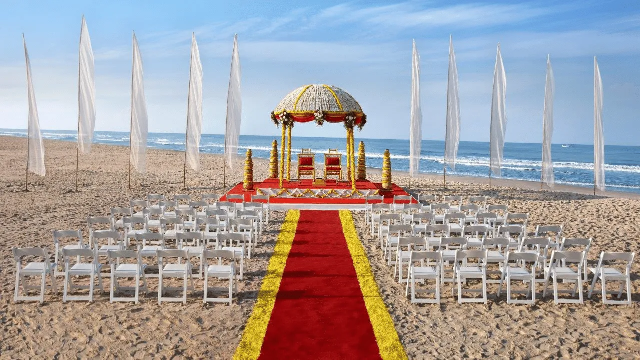 Beachfront ceremony setting at Caravela Beach Resort Goa in Varca