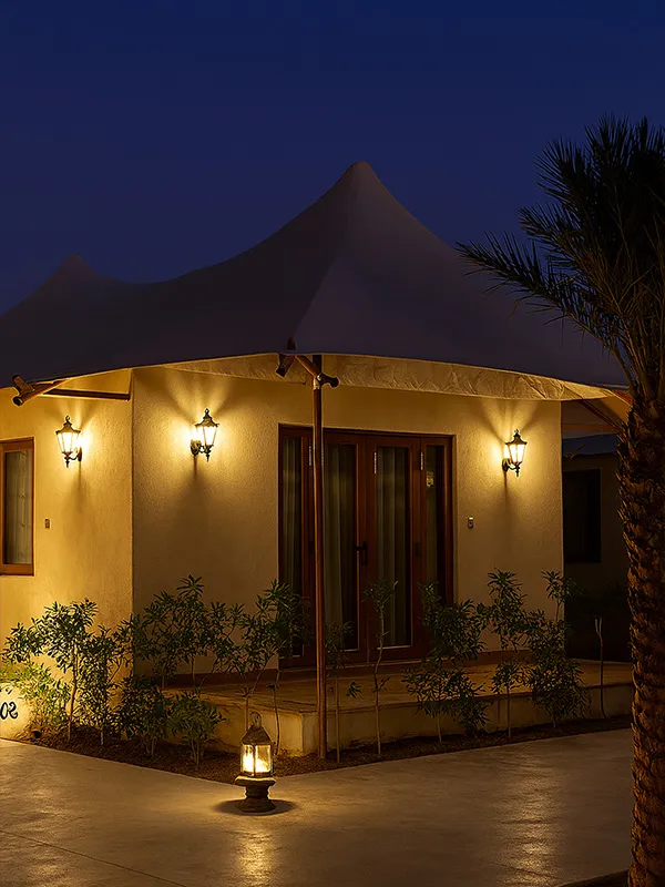 Event lawns and themed palace facade of Chokhi Dhani The Palace Hotel at the edge of the Thar desert, Jaisalmer