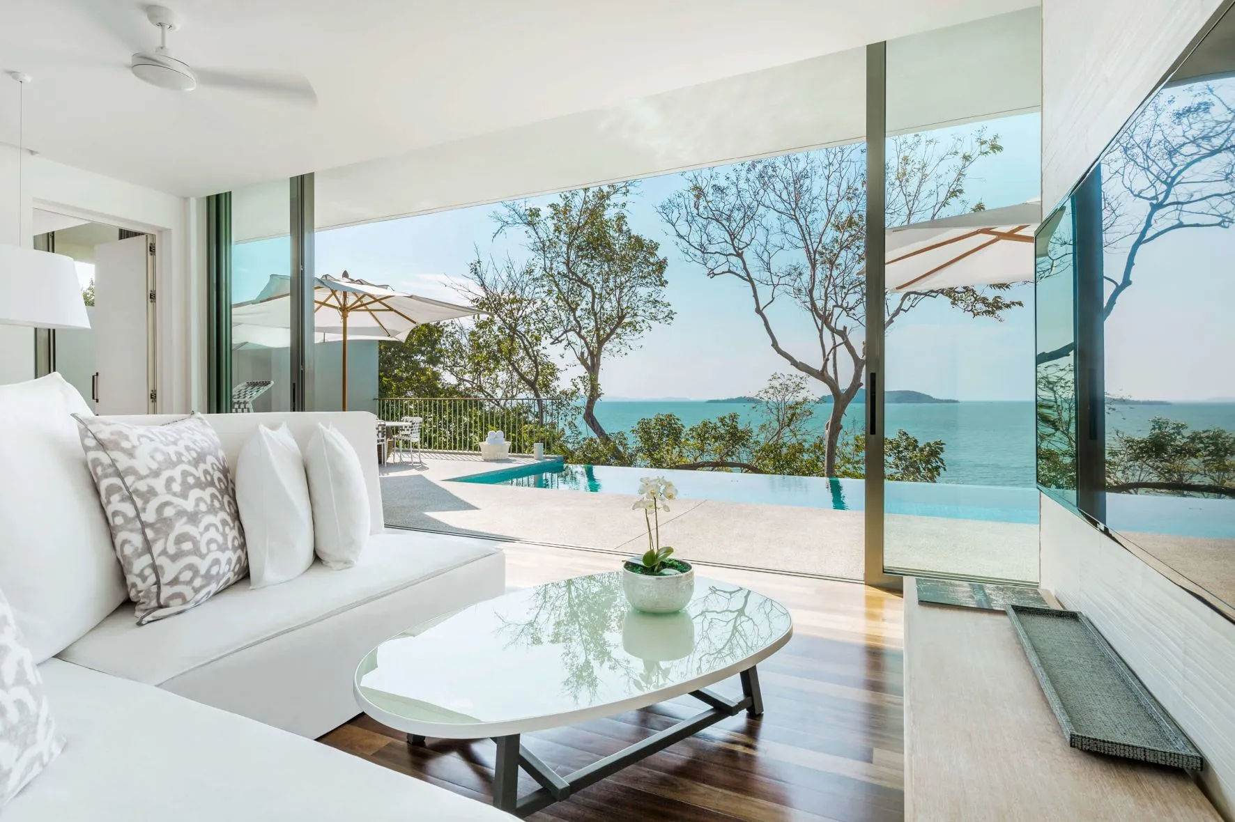 COMO Point Yamu Phuket headland and clifftop pool above Phang Nga Bay at golden hour