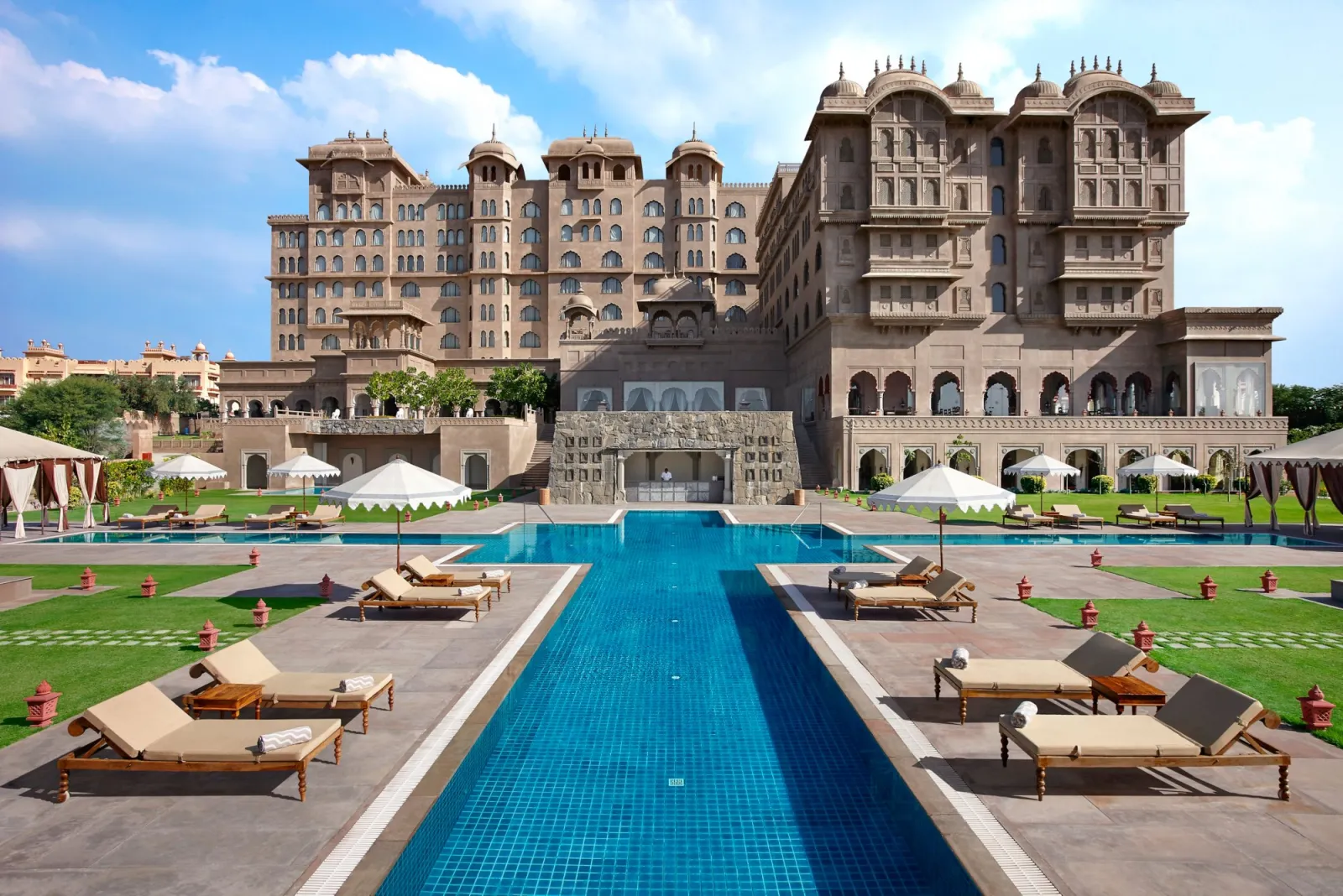 Grand staircase and arrival porte-cochere with jharokha balconies at Fairmont Jaipur