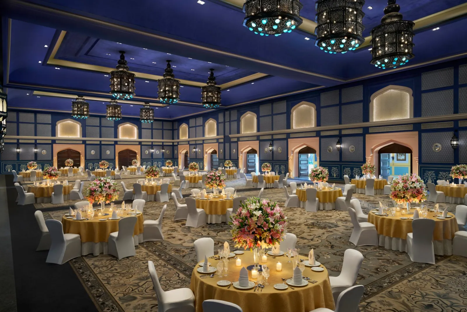 Pillarless Grand Ballroom with crystal chandeliers and durbar-scale layout at Fairmont Jaipur