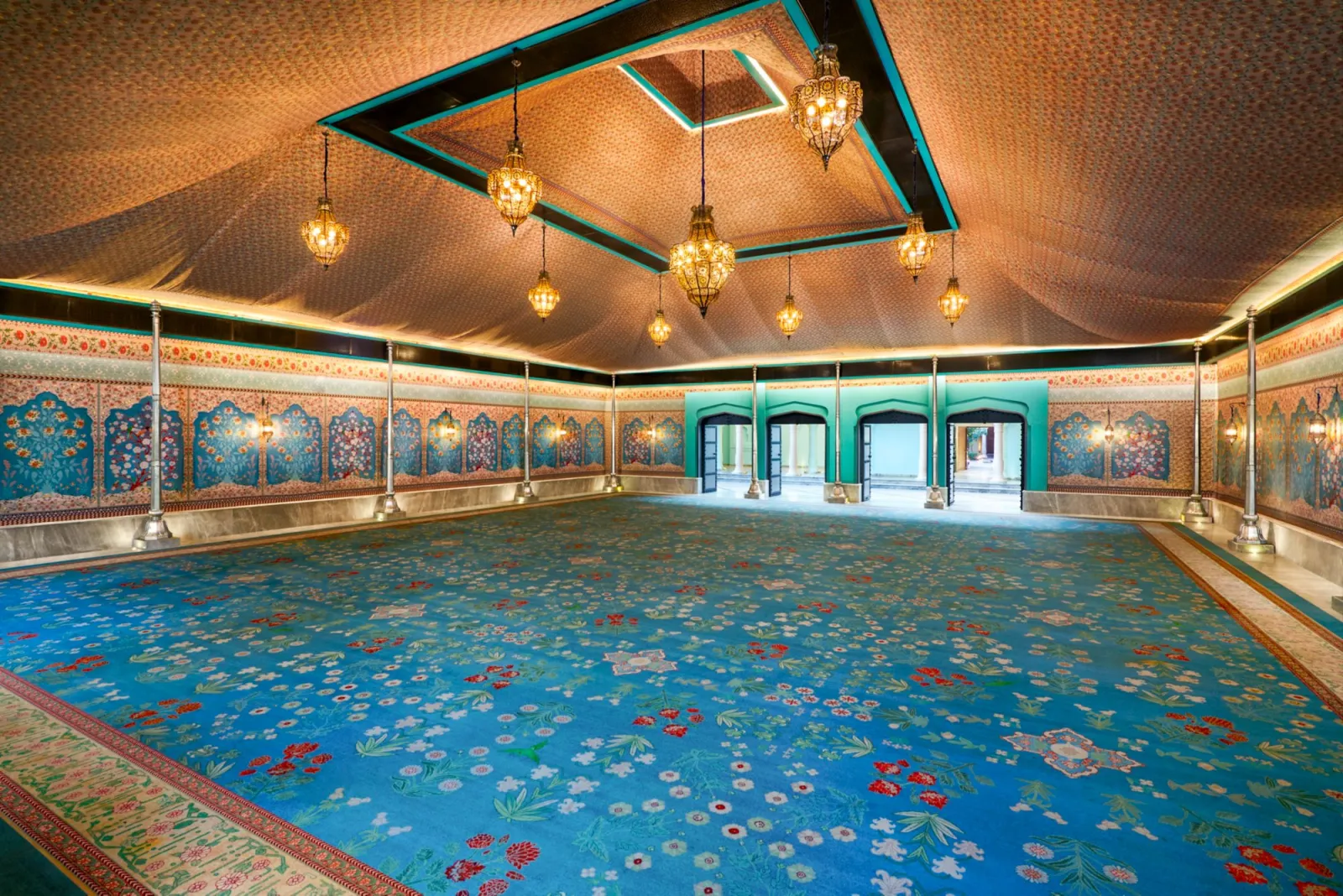 Charbagh Mughal-garden courtyard and landscaped pool terrace at Fairmont Jaipur