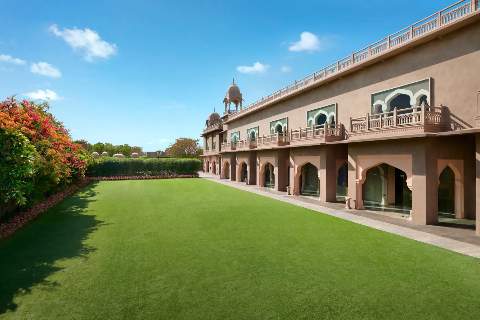 Floral mandap ceremony setting in the Charbagh Mughal-garden courtyard at Fairmont Jaipur